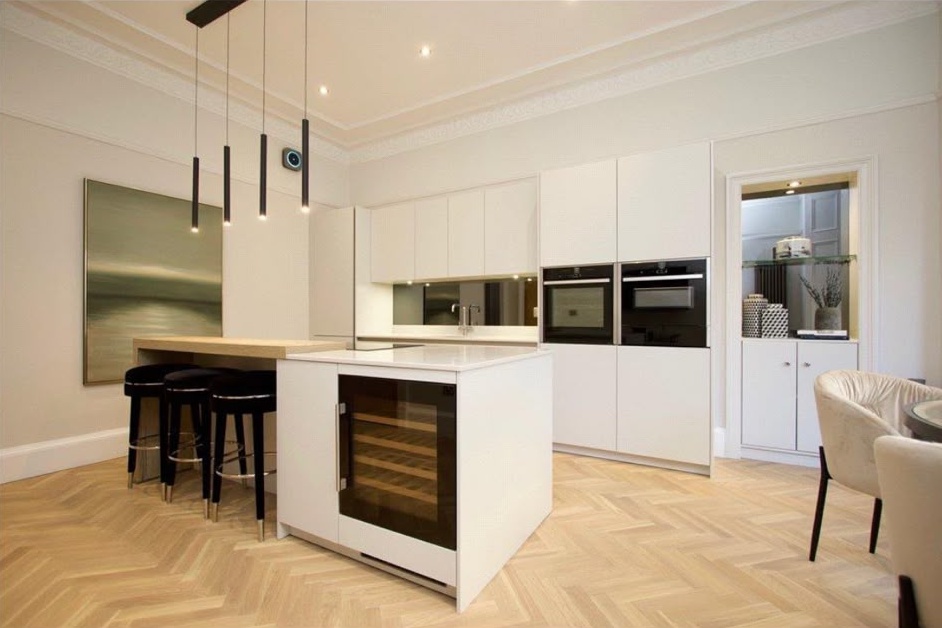 Freshly plastered and decorated open plan kitchen with smooth walls and ceiling in a Glasgow home